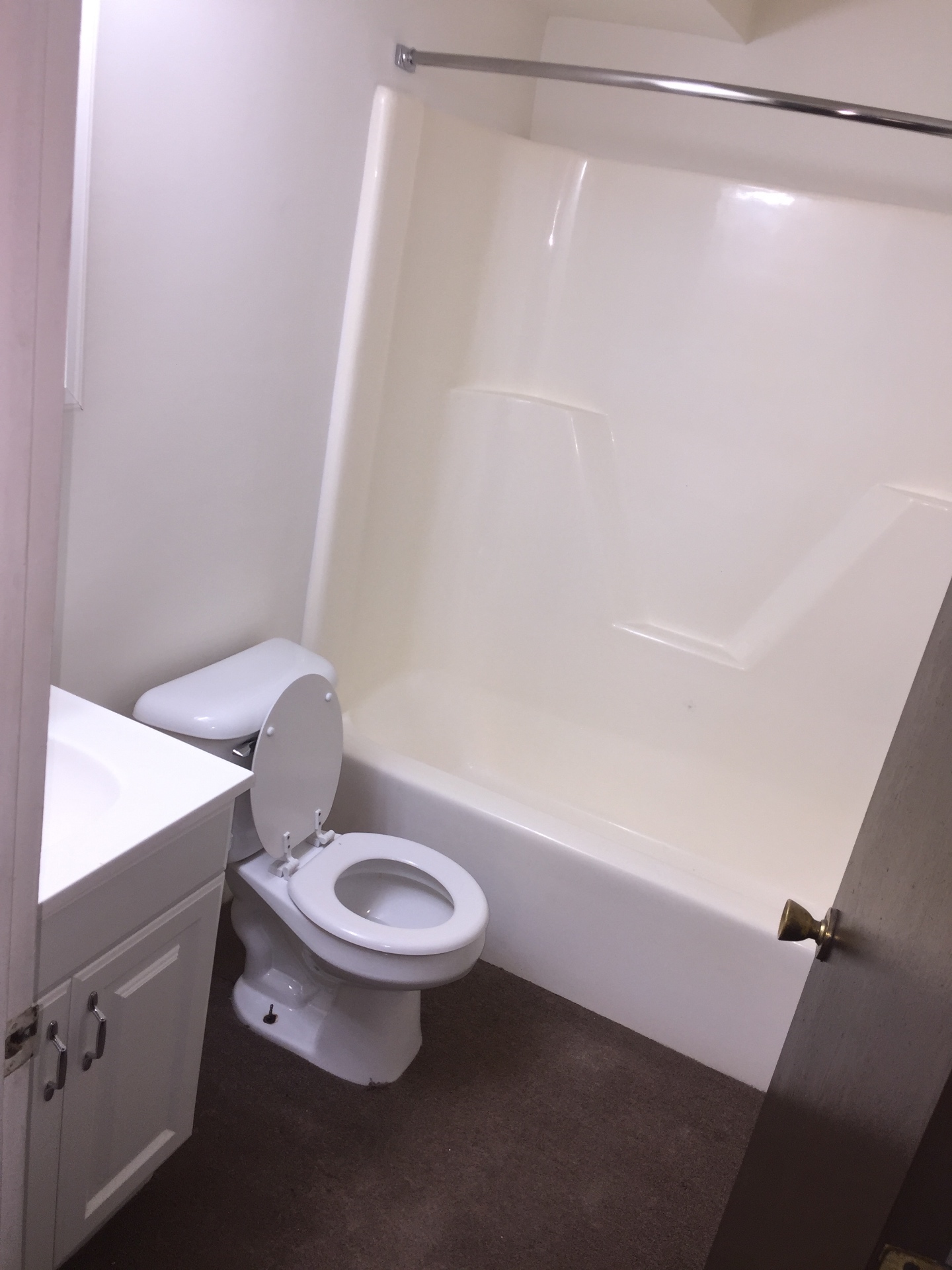 Post-construction residential bath before and after — after